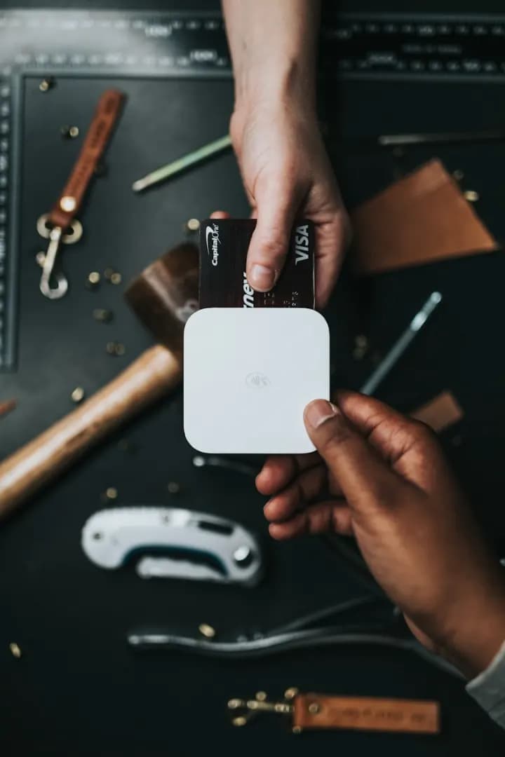 Buyer tapping a card to check an item before paying
